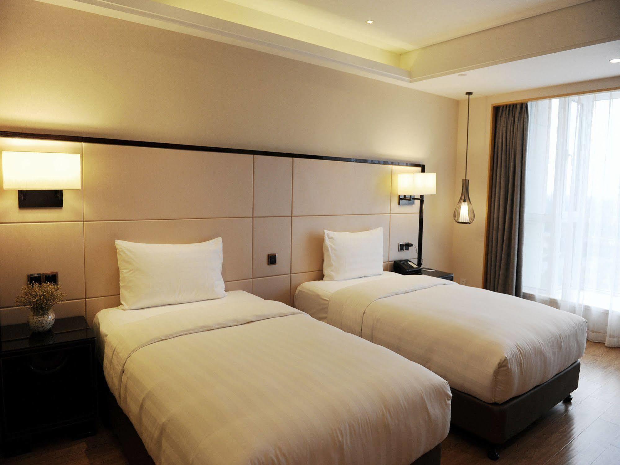 Pullman Qingdao Ziyue Hotel Exterior photo